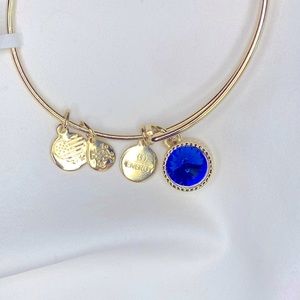 Alex and Ani crystal Saphire gold toned bangle.